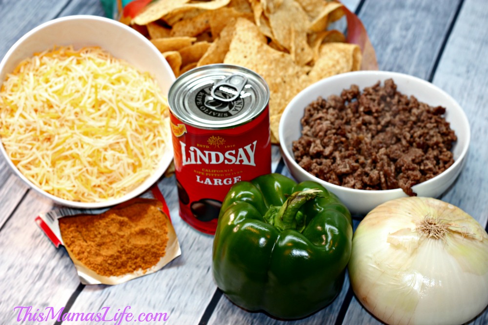 Nachos are simple to make! Grab some chips,seasoned hamburger and then top theme off with Green Pepper, Onions, Cheese and Lindsay Olives